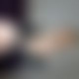 Badeanzug mit Latexhandschuhen