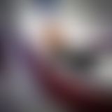 Im hautengen schwarzen Latexcatsuit