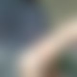 Kuschelpulli und lange Lippen