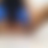 Eincremen mit Latexhandschuhen