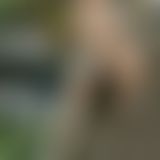 Regenjacke, Gummistiefel und Ballerinas