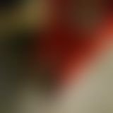 Kittel mit Hausschuhe und Hüpfball